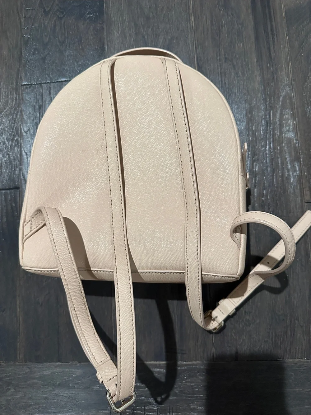 kate spade beige backpack with colorful cactus, chili and floral appliqués